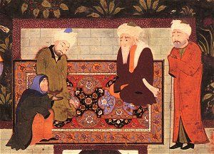 Mom has a word with the Shaikh. Detail from An Old Woman and Two Sages in a Garden. Bukhara, 1520. Click for complete painting.